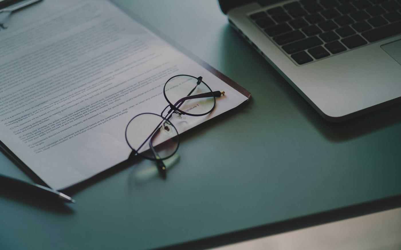 Glasses on notepad.